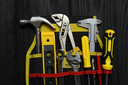 Set of tools for repair. Hammer pliers screwdriver angle pliers adjustable wrench. Many tools 
