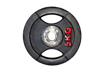 A black 5 kg weight plate on white isolated background