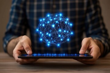 A person holds a tablet displaying a glowing, interconnected network sphere, symbolizing global connectivity and digital technology