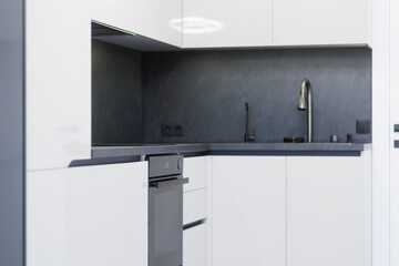 Modern kitchen with sleek design and minimalist features for efficient cooking and entertaining