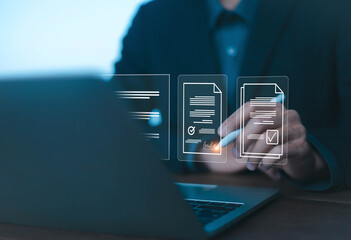 Business people use computers to upload documents from folders to manage online document databases...