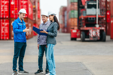 Female Manager Supervising Workers at Shipping Container Yard.