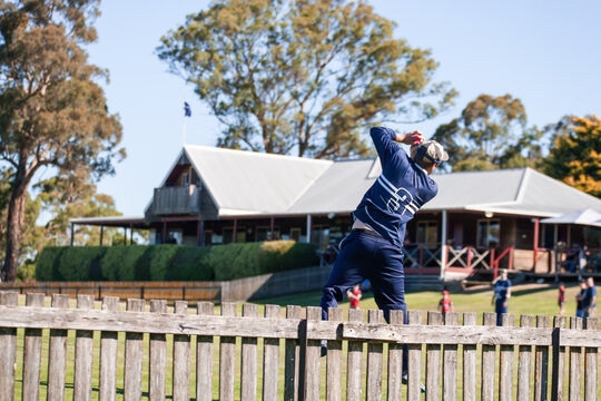 Fielder taking a catch in a  T20 Cricket Match
