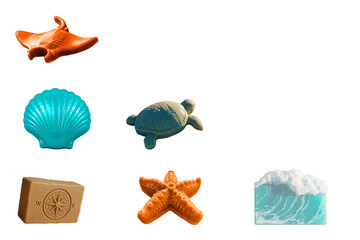 Set of handmade sea-themed soap bars on white background with copy space. Summer spa collection.