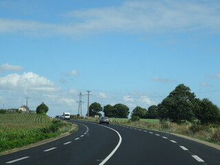 Turning on a departmental road in the Normandy countryside - Virage sur une route départementale...
