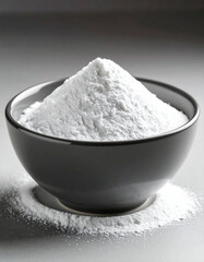 White zinc oxide powder in small bowl. Healthcare and medical supplement product.