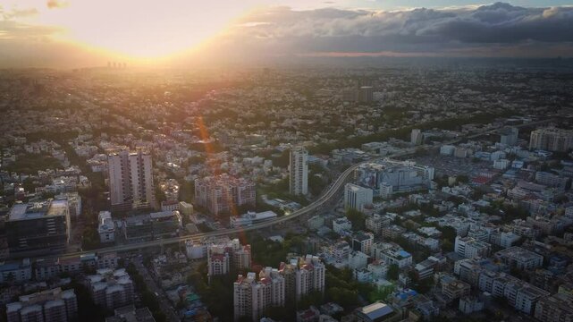 Beautiful drone shot flying over the Bangalore city at evening during sunset. Bangalore is also known as IT city or IT capital of India	