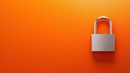 Fototapeta premium Modern silver padlock displayed diagonally on a bright orange backdrop with crisp contrast