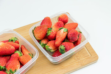 Fresh strawberries in the transparent box