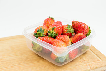 Fresh strawberries in the transparent box