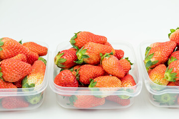 Fresh strawberries in the transparent box