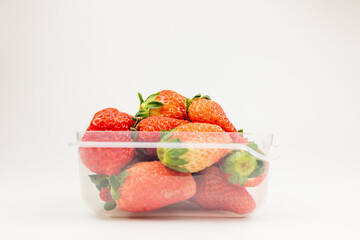 Fresh strawberries in the transparent box