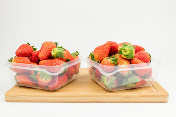 Fresh strawberries in the transparent box