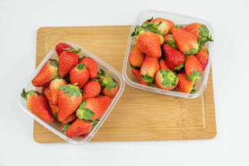 Fresh strawberries in the transparent box