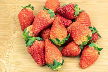 Fresh strawberries on the cutting board