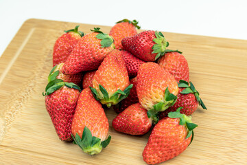 Fresh strawberries on the cutting board