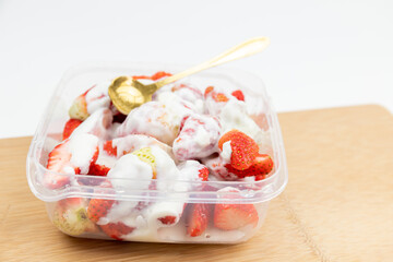 Yogurt mixed with strawberries