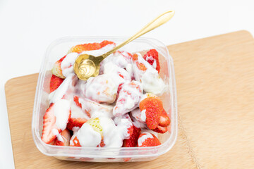 Yogurt mixed with strawberries