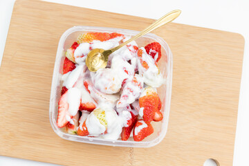 Yogurt mixed with strawberries
