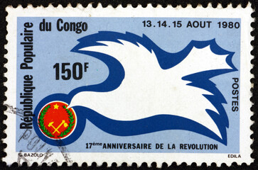 Postage stamp Congo 1980 dove on flag, 17th anniversary of the Revolution