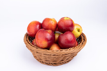 Fresh nectarine fruits in the fruit basket