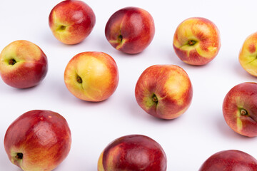 Neatly arranged fresh red plums