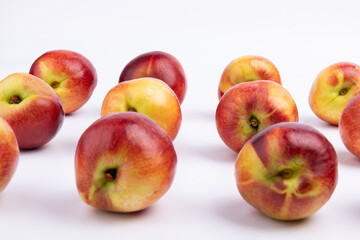 Neatly arranged fresh red plums
