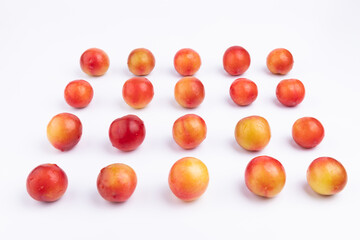 Obraz premium Neatly arranged fresh red plums