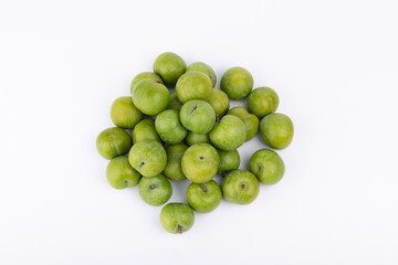 Fresh plums on a white background