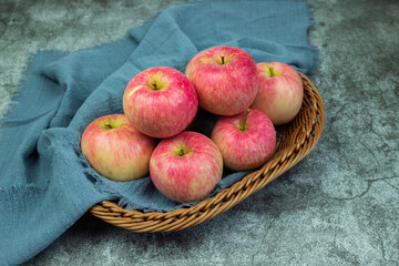 Fresh red Fuji apples in the fruit basket