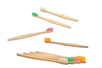 Bamboo toothbrush isolated on a white background.