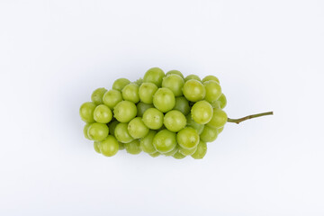 Sunburst rose grapes on a white background