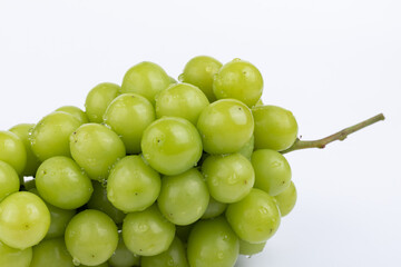 Sunburst rose grapes on a white background