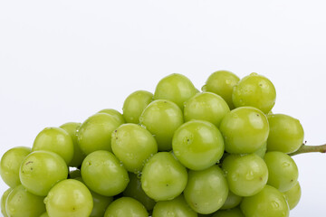 Sunburst rose grapes on a white background