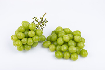 Sunburst rose grapes on a white background