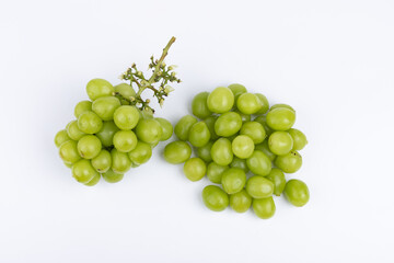 Sunburst rose grapes on a white background