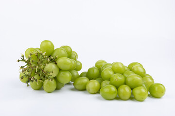 Sunburst rose grapes on a white background
