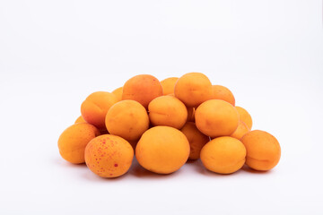 A pile of fresh apricot fruits