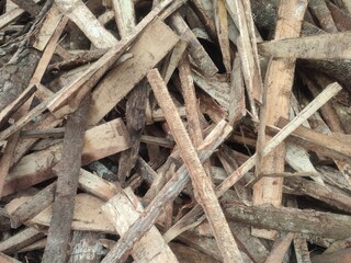 A pile of wood chips for fuel represents renewable energy, offering a sustainable alternative to fossil fuels and supporting eco-friendly heating and power solutions.