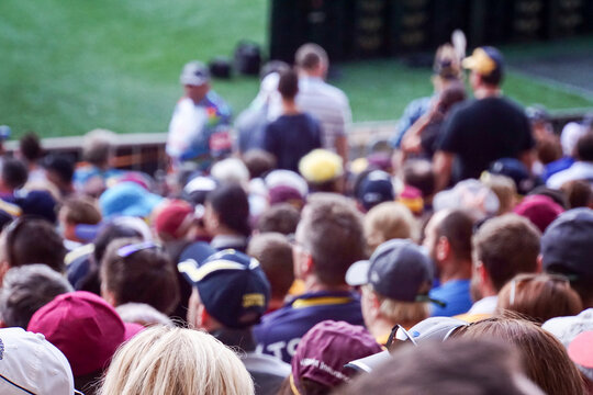 Crowded heads at football game