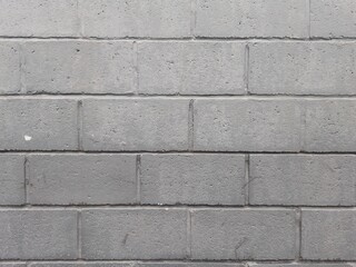 gray background. imitation of brickwork on a cement surface. place for creative text, advertising, congratulations. Copy space 