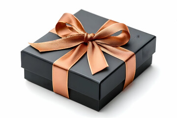 Fototapeta premium A beautifully wrapped black gift box with a shiny copper ribbon is perfect for any occasion. Ideal for celebrations, holidays, and special moments.