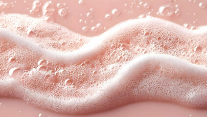 Obraz premium A close-up view of soft, pink foamy bubbles on a surface, creating a serene and relaxing atmosphere. Perfect for wellness and skincare themes.