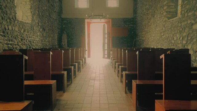 POV shot of the interior of an old small church in Saint-Martin-d'Uriage, French Alps