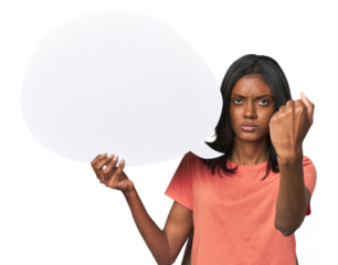 Indian woman with dialogue bubble showing fist to camera, aggressive facial expression.