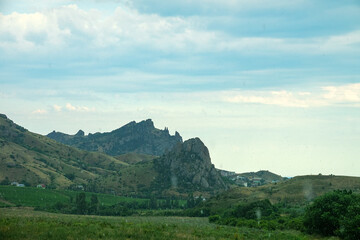 Eastern part of Crimean Mountains. Karadag volcano with basalt lava remnants (stone pillars) 150...