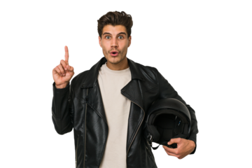 Young caucasian man holding a motrbike black helmet isolated having some great idea, concept of creativity.