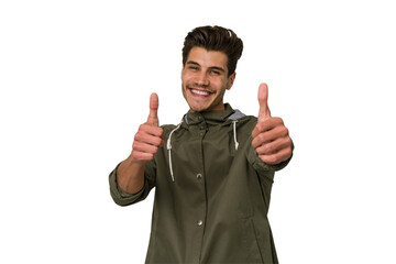 Young handsome caucasian man isolated on white background raising both thumbs up, smiling and confident.