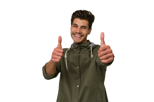 Young handsome caucasian man isolated on white background raising both thumbs up, smiling and confident.