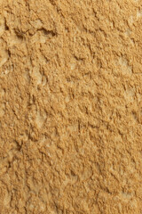 Orange  polyurethane foam harden structure abstract textured backdrop, close up